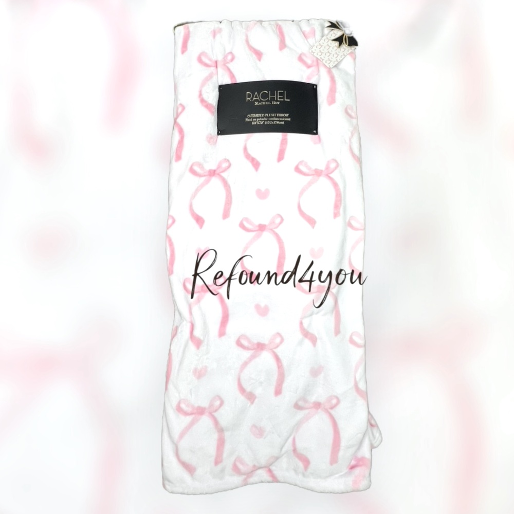 Rachel Roy - ‘Soft Pink/White Bows’ plush oversized throw. 60” x 70”. NWT.